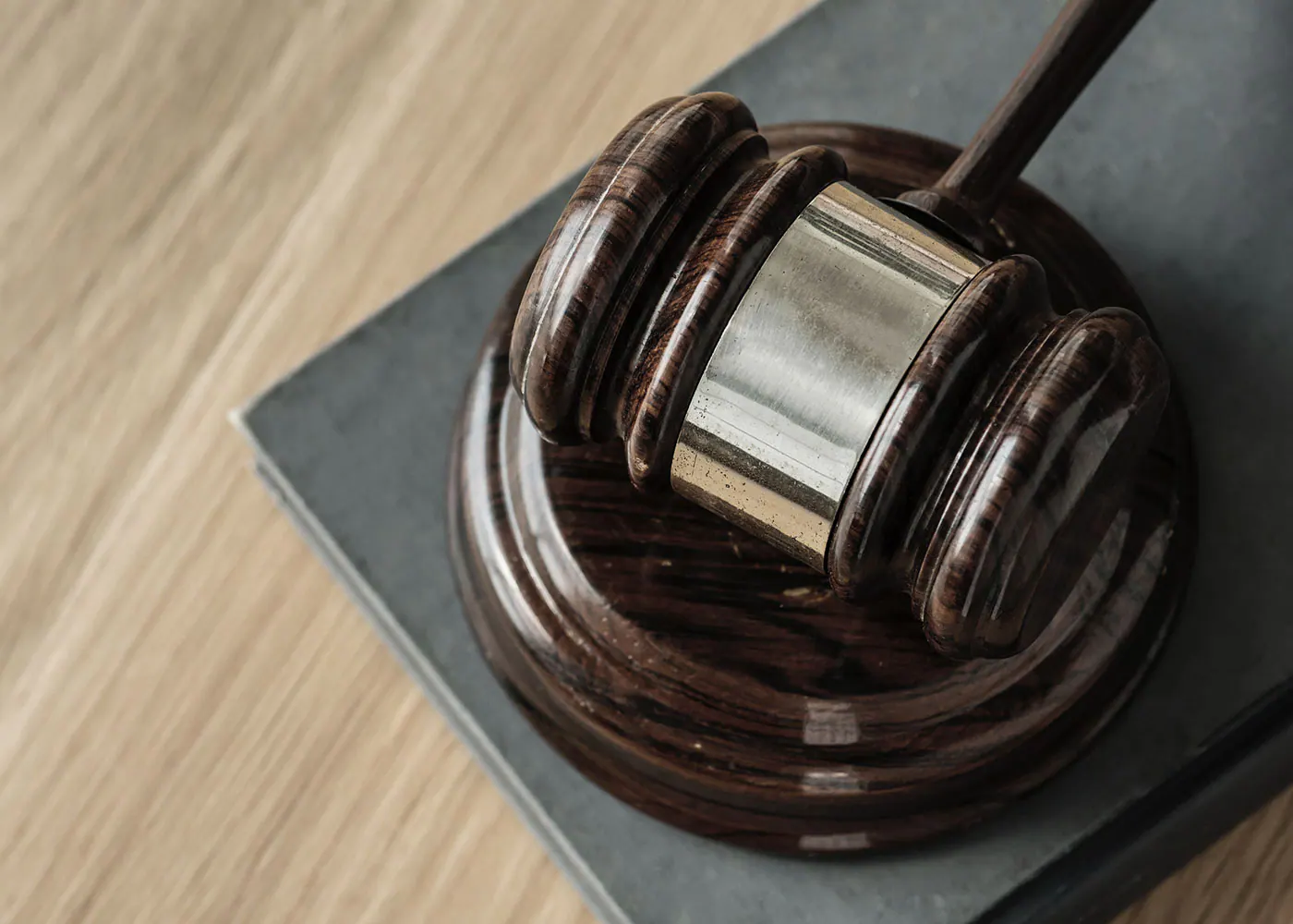 Judge’s gavel resting on an open law book