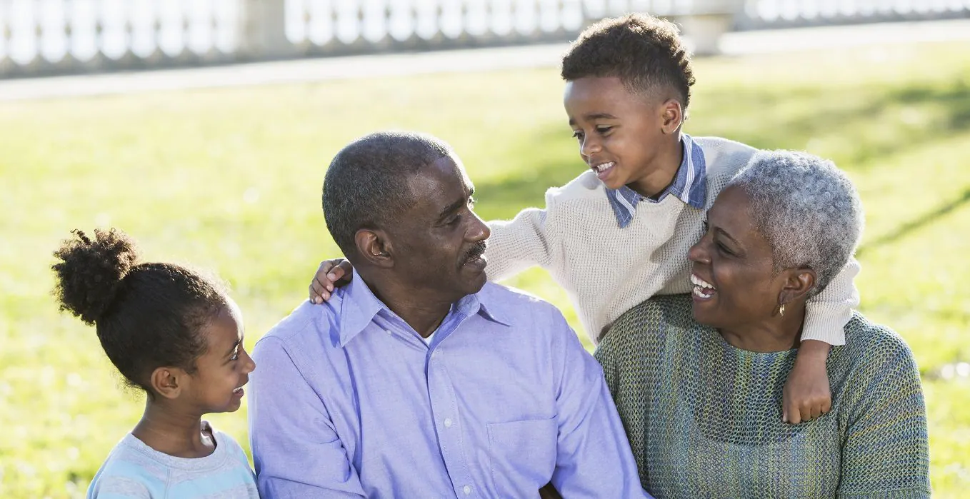 Multigenerational family gathered outdoors