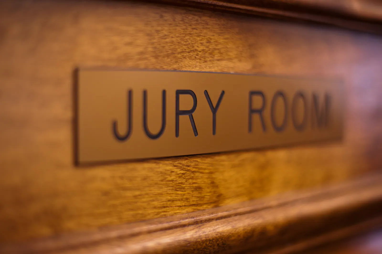 Wooden sign reading ‘Jury Room’