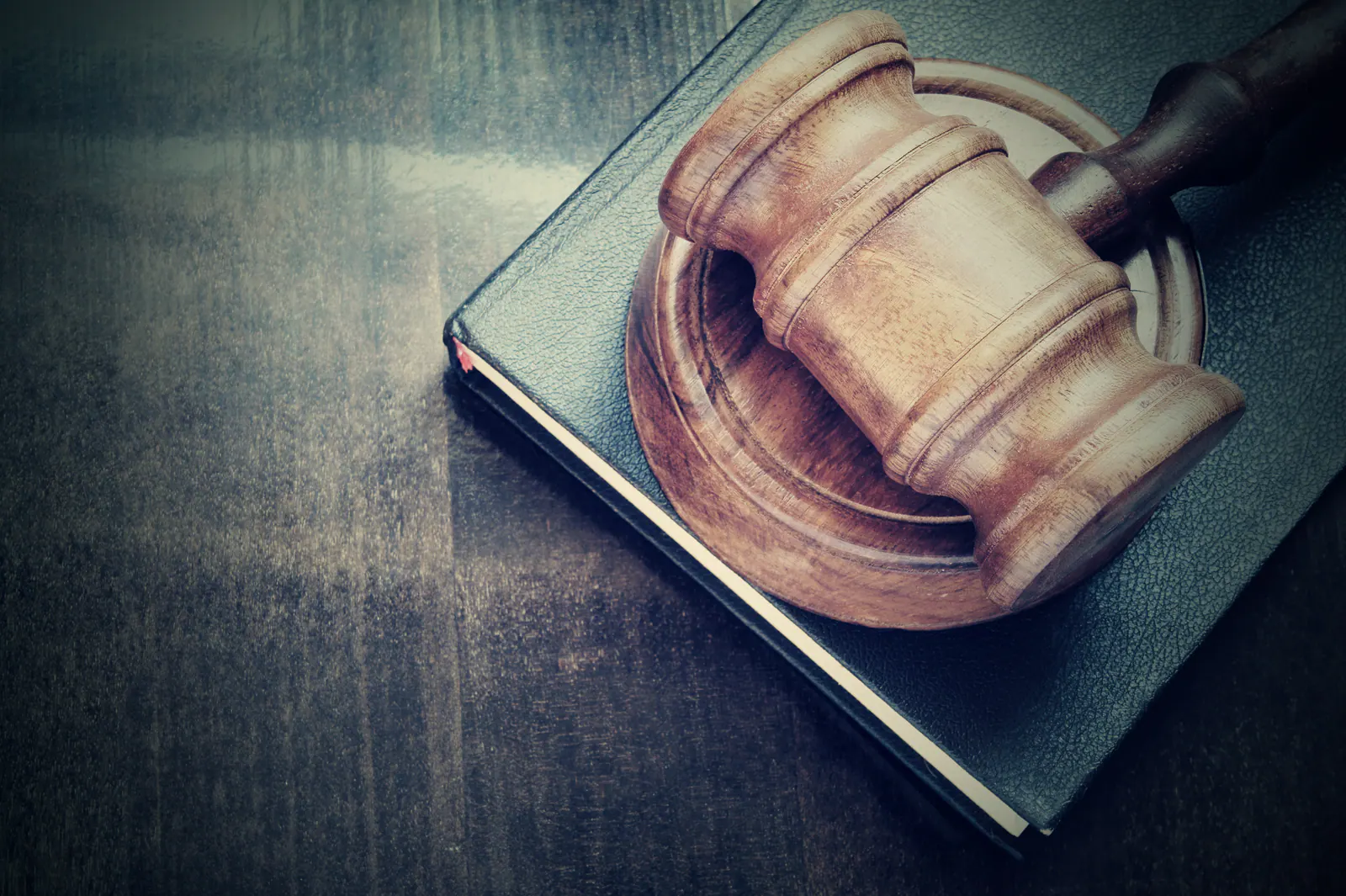 Judge’s gavel resting on a law book