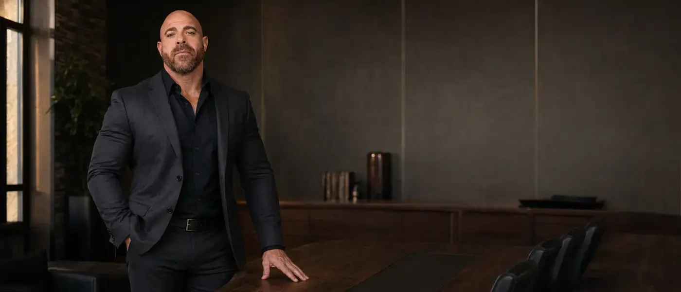 Attorney James Madsen standing in a conference room