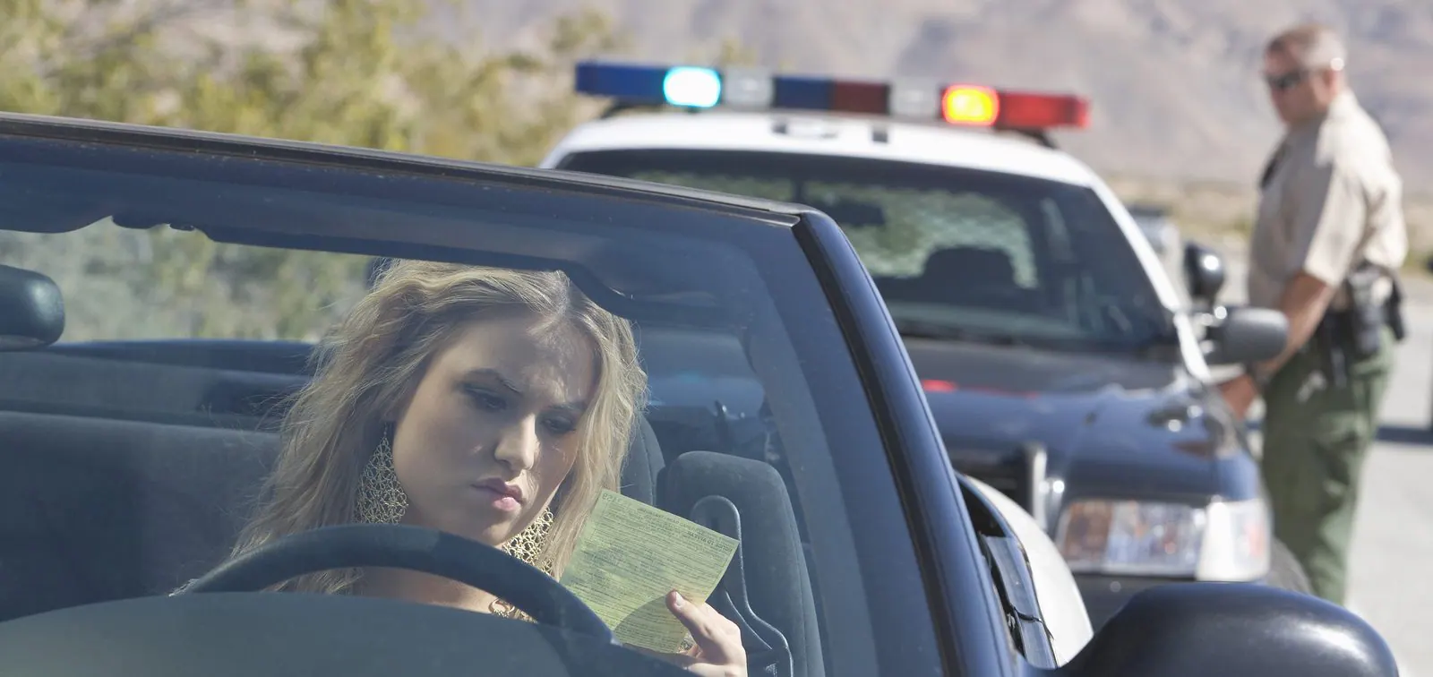 Driver stopped by a police vehicle